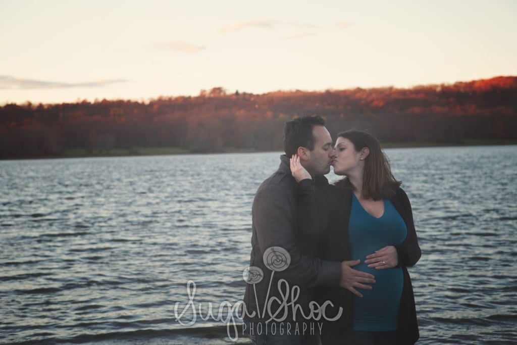 SugaShoc_Photography_Maternity_Photographer_Bucks County_Doylestown_PA_mother_posed_at_sunset_outdoors_with_husband_by_water