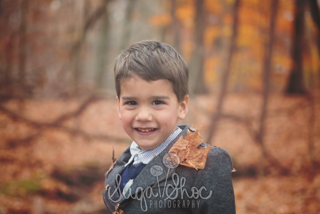 SugaShoc_Photography_Family_Photographer_Bucks County_Doylestown_PA_boy_posed_with_fall_leaves