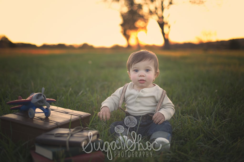 SugaShoc_Photography_Baby_Photographer_Bucks County_Doylestown_PA_one_year_old_session_at_park_in_grass_at_sunset