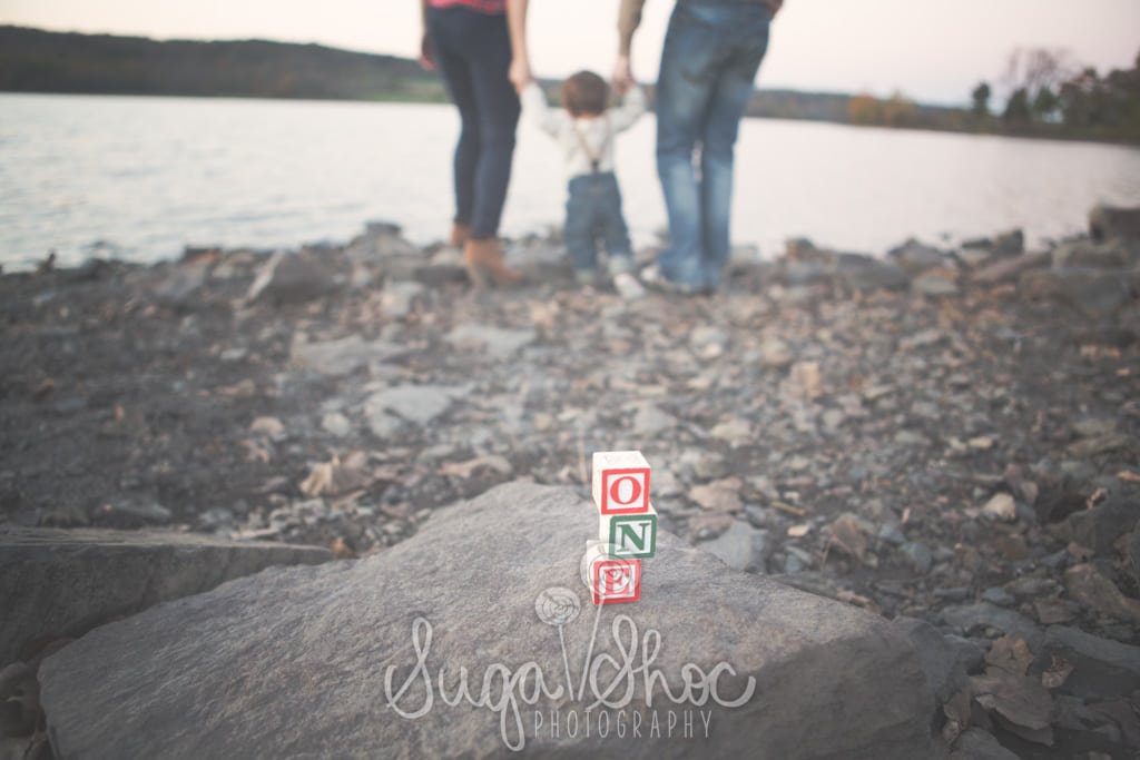 SugaShoc_Photography_Baby_Photographer_Bucks County_Doylestown_PA_one_year_old_session_at_park_at_sunset_with_parents_at_water_blocks