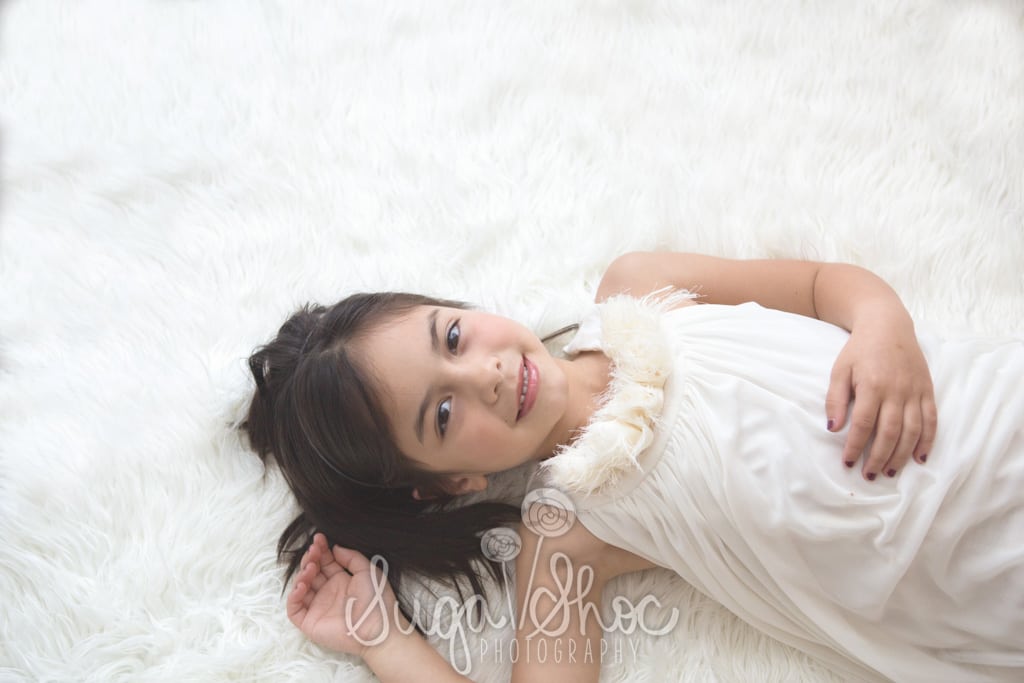 SugaShoc_Photography_Children_Photographer_Bucks County_Doylestown_PA_girl_child_laying_on_white_rug
