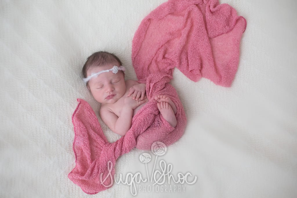 SugaShoc_Photography_Newborn_Photographer_Bucks County_Doylestown_PA_newborn_wrapped_in_pink_with_headband