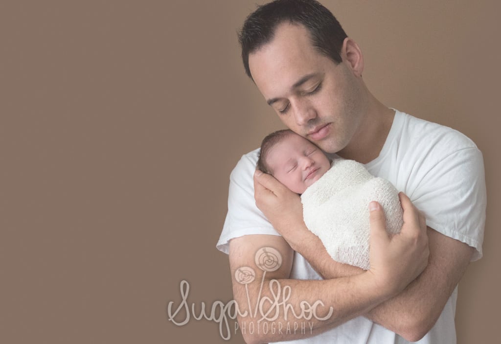 SugaShoc_Photography_Newborn_Photographer_Bucks County_Doylestown_PA_newborn_wrapped_in_white_held_by_dad
