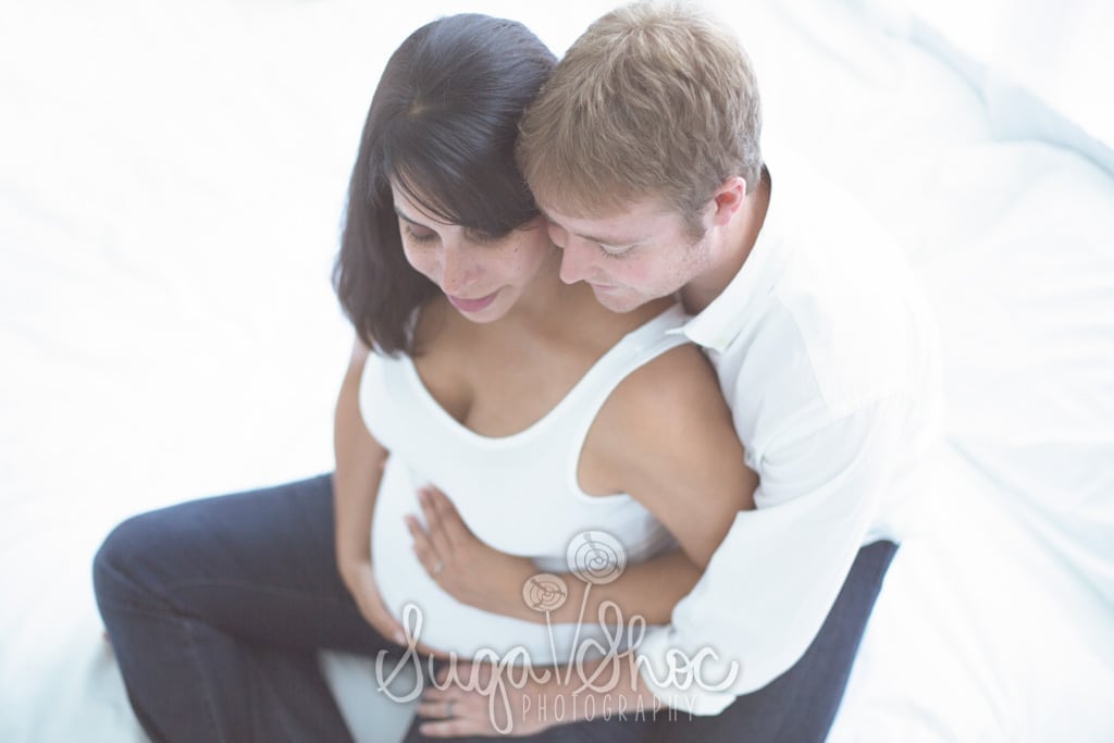 SugaShoc_Photography_Maternity_Photographer_Bucks County_Doylestown_PA_couple_posed_hands_on_belly_looking_down