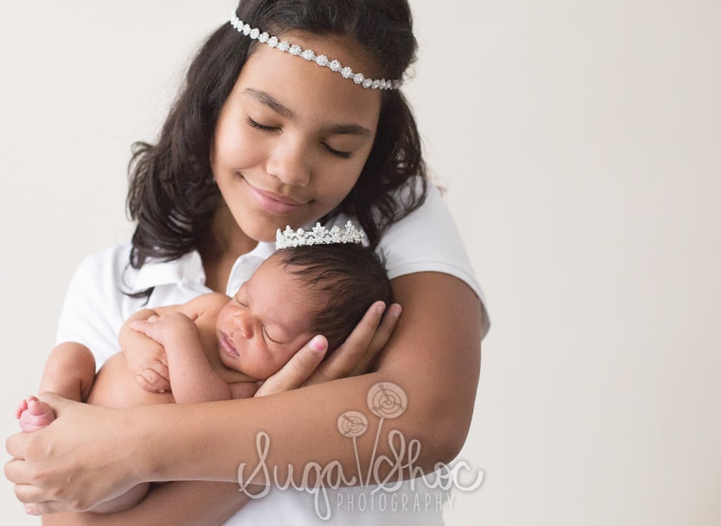 newborn photographer bucks county newborn photographer using sleepy shimmer crown and tieback