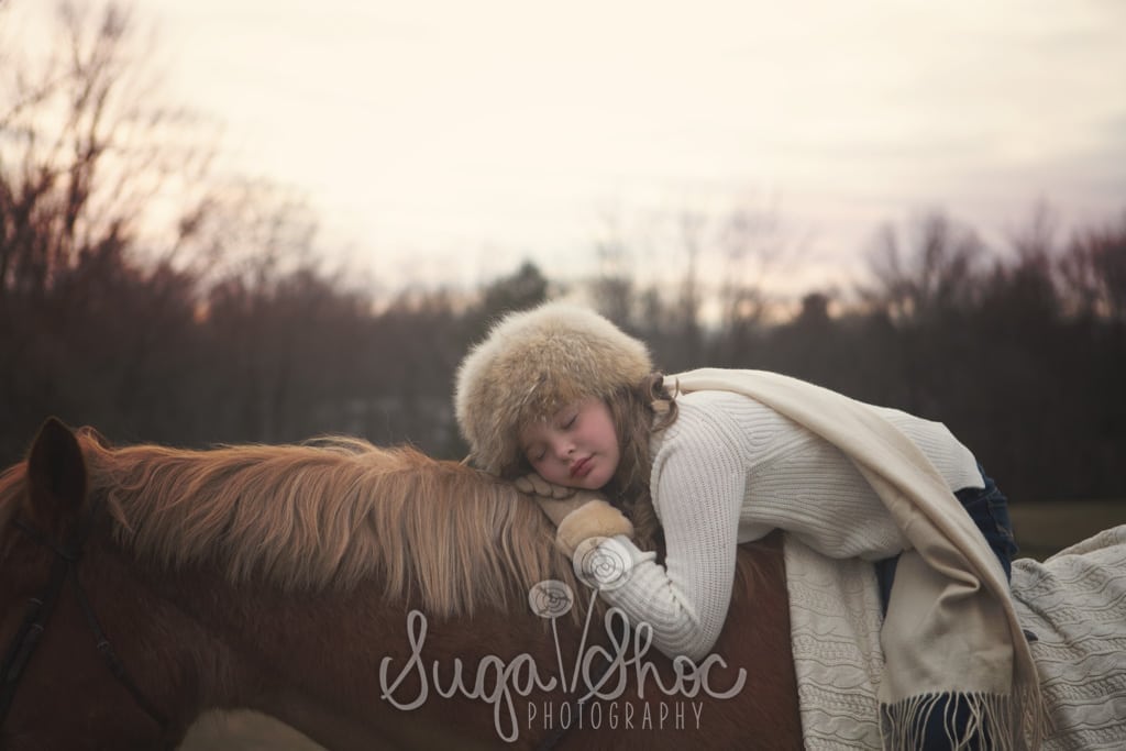 SugaShoc_Photography_Family_Children_Photographer_Bucks County_Doylestown_PA__girl_with_fur_hat_outdoor_riding_horse