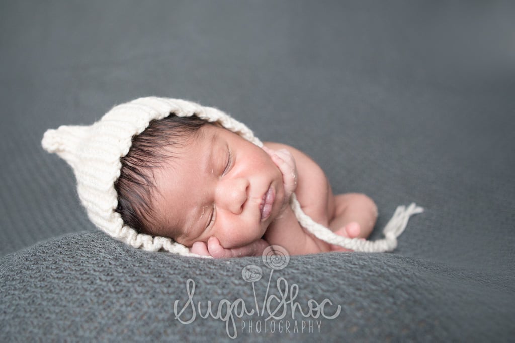 newborn with pixie hat
