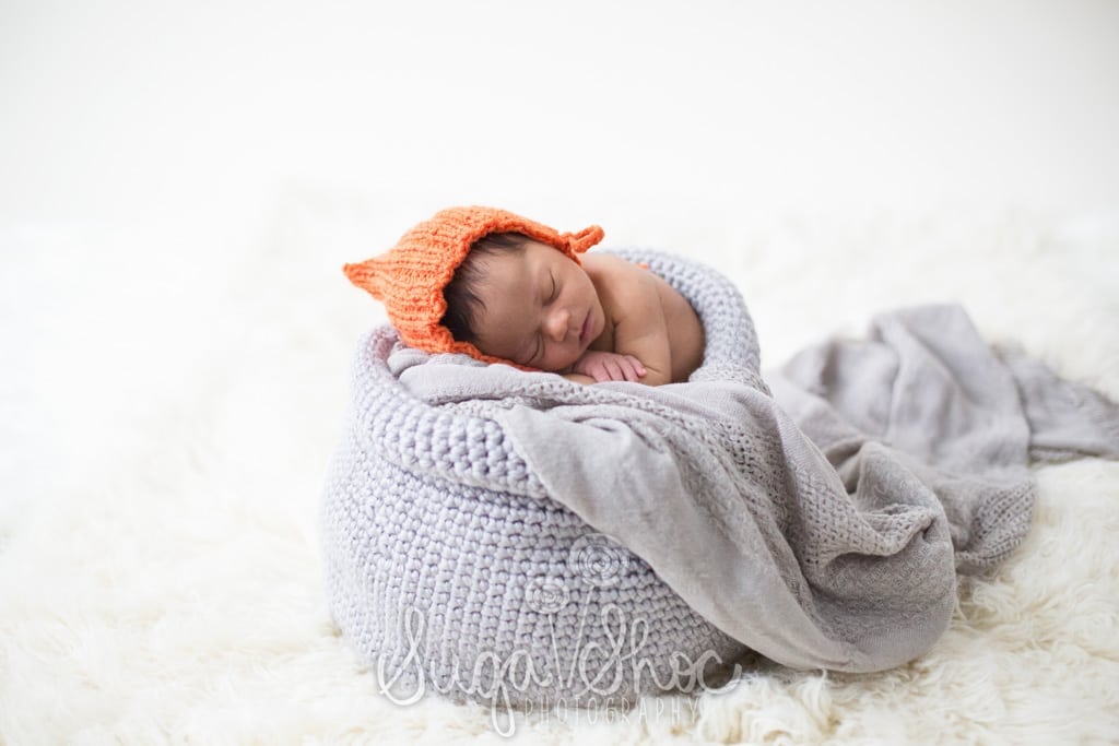 newborn photographer bucks county newborn photographer using knitted sack or bowl