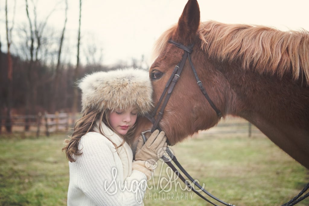SugaShoc_Photography_Family_Children_Photographer_Bucks County_Doylestown_PA__girl_with_fur_hat_outdoor_horse