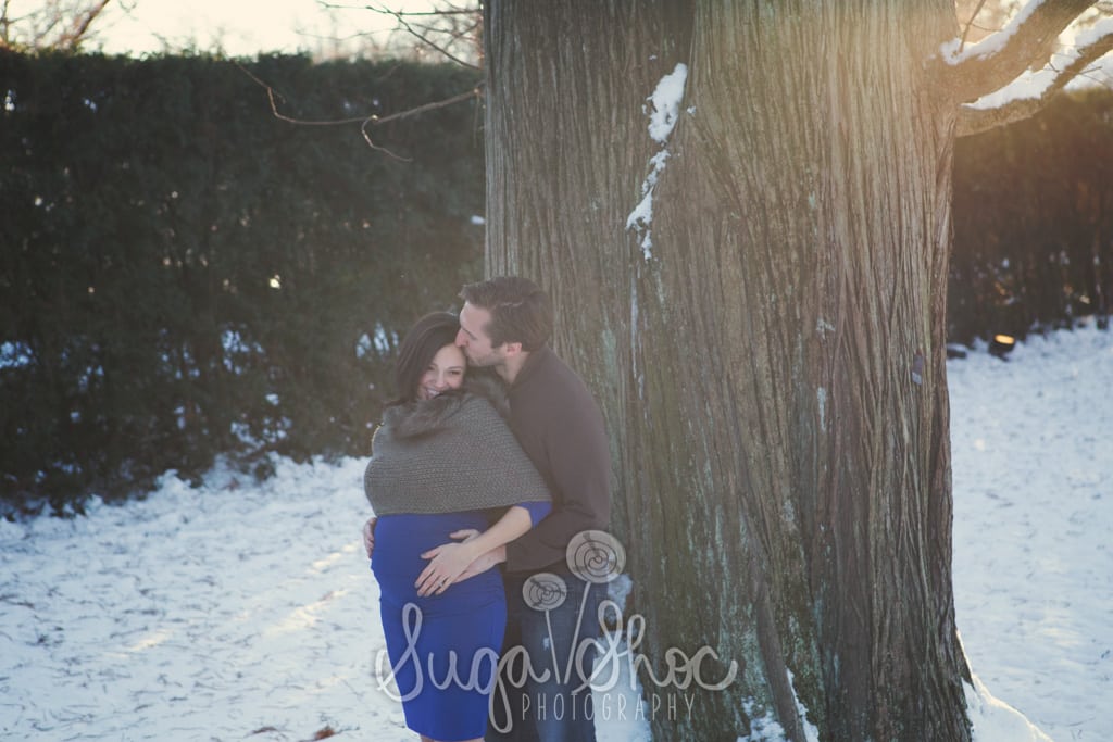 SugaShoc_Photography_Maternity_Photographer_Bucks County_Doylestown_PA_couple_snow_maternity_session_at_longwood_gardens_posed_by_tree