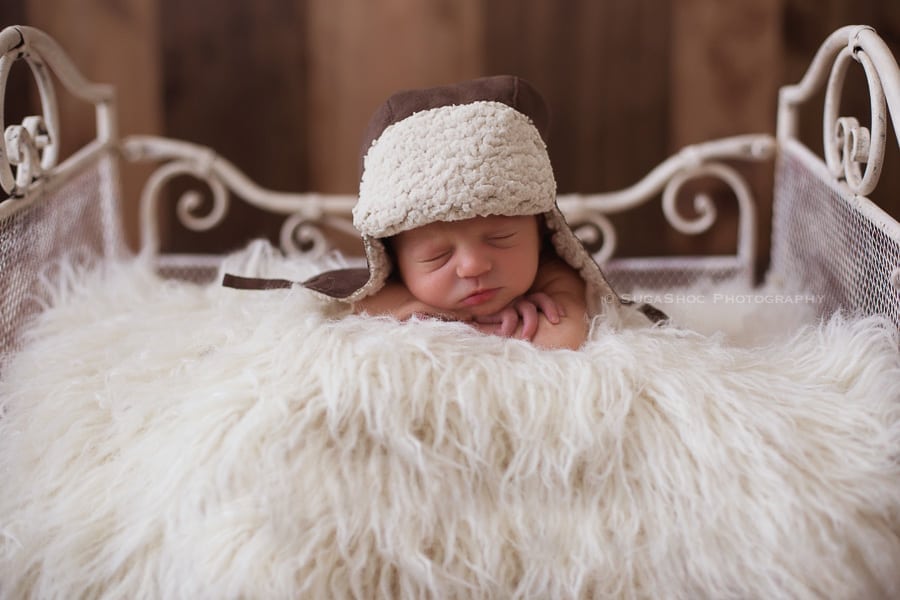 SugaShoc_Photography_Newborn_Photographer_Bucks_County_PA_Doylestown_PA_newborn_with_aviator_hat_pose