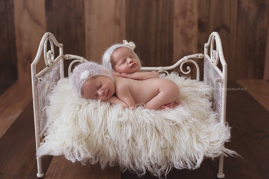 SugaShoc_Photography_Newborn_Twins_Photographer_Bucks_County_PA_Doylestown_PA_newborn_twin_pose_ideas_on_bed_pure_knits_bear_hat