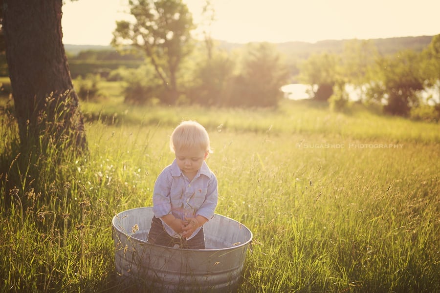 SugaShoc_Photography_Baby_Photographer_Bucks_County_PA_Doylestown_PA_One_Year_Old_Outdoor_session_standing_in_bucket