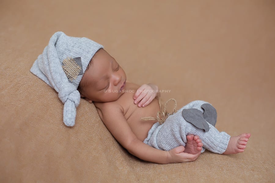SugaShoc_Photography_Newborn_Photographer_Bucks_County_PA_Doylestown_PA_newborn_in_hat_and_pants_posing_ideas