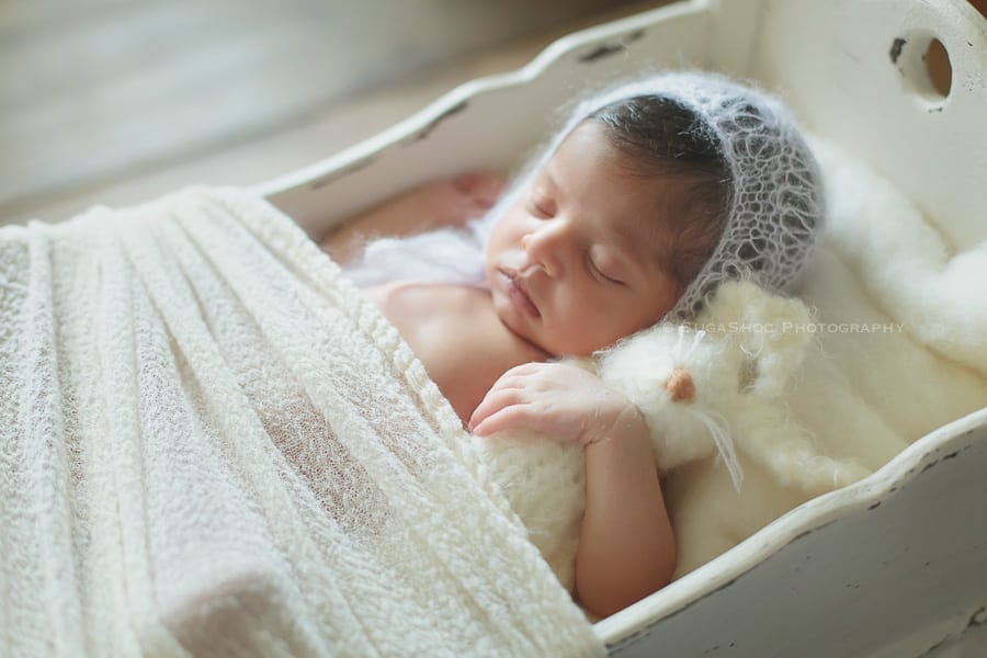 SugaShoc_Photography_Newborn_Photographer_Bucks_County_PA_Doylestown_PA_newborn_in_antique_wooden_bed_newborn_posing_ideas