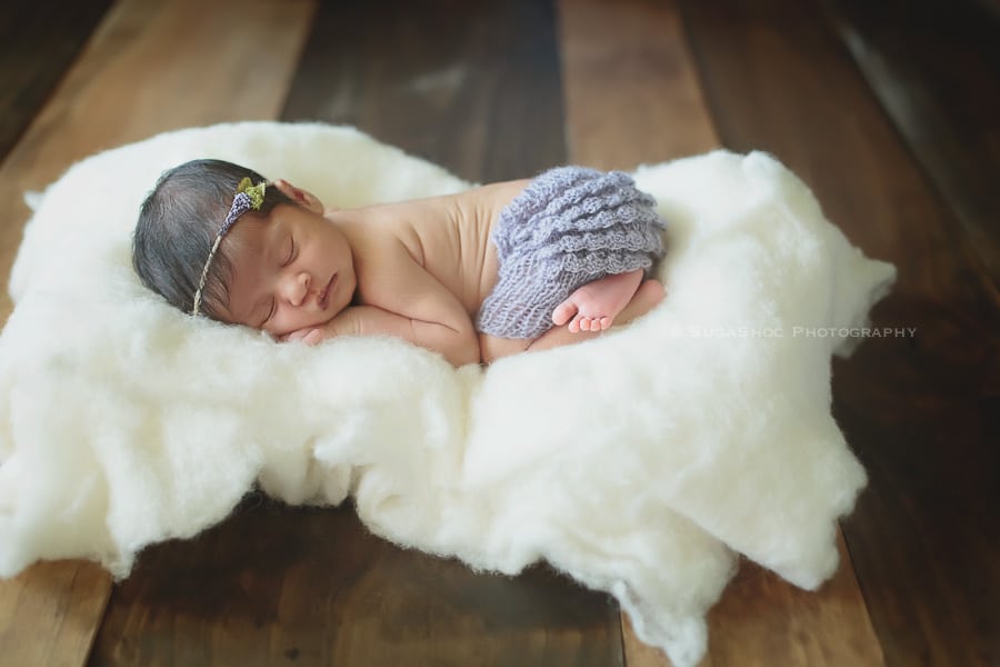 SugaShoc_Photography_Newborn_Photographer_Bucks_County_PA_Doylestown_PA_newborn_on_fluff_ruffle_shorts_newborn_posing_ideas