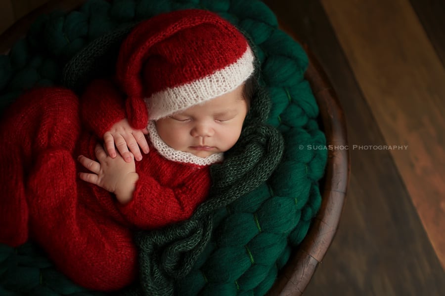 SugaShoc_Photography_Newborn_Photographer_Bucks_County_PA_Doylestown_PA posing_in_a_bowl_with_santa_outfit_newborn_posing_ideas