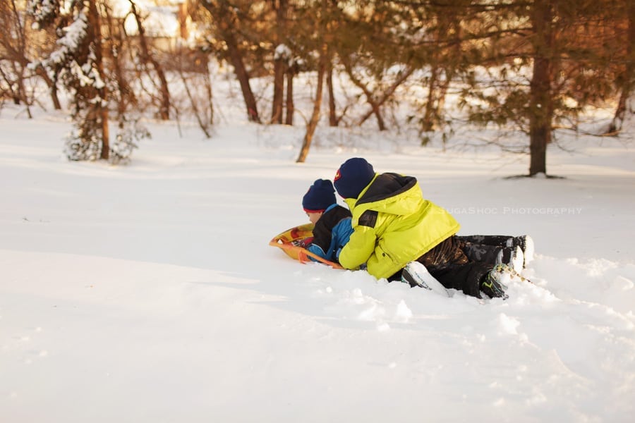 SugaShoc_Photography_Newborn_Photographer_Bucks_County_PA_Doylestown_PA_snow_sledding_with_brother