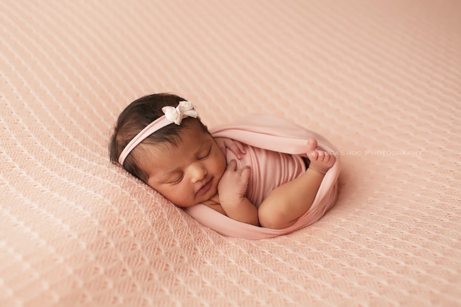 newborn baby girl wrapped up in pink sugashoc_photography_newborn_photographer_bucks_county_pa_doylestown_pa