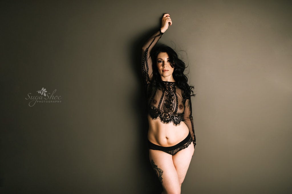 SugaShoc Photography Birthday Boudoir pose standing wearing black lace top and panties