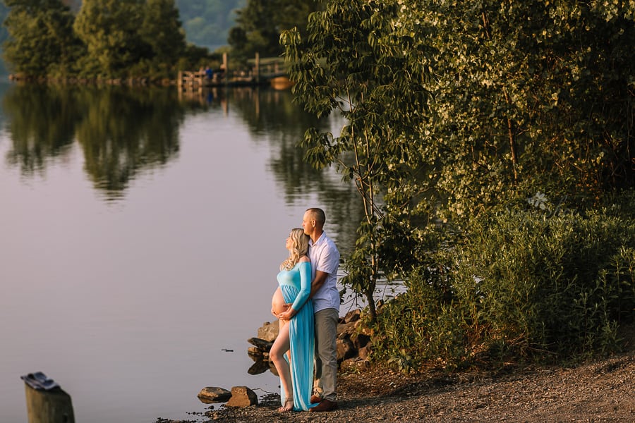Sugashoc Photography Doylestown Maternity Photographer couple by lake looking out at water