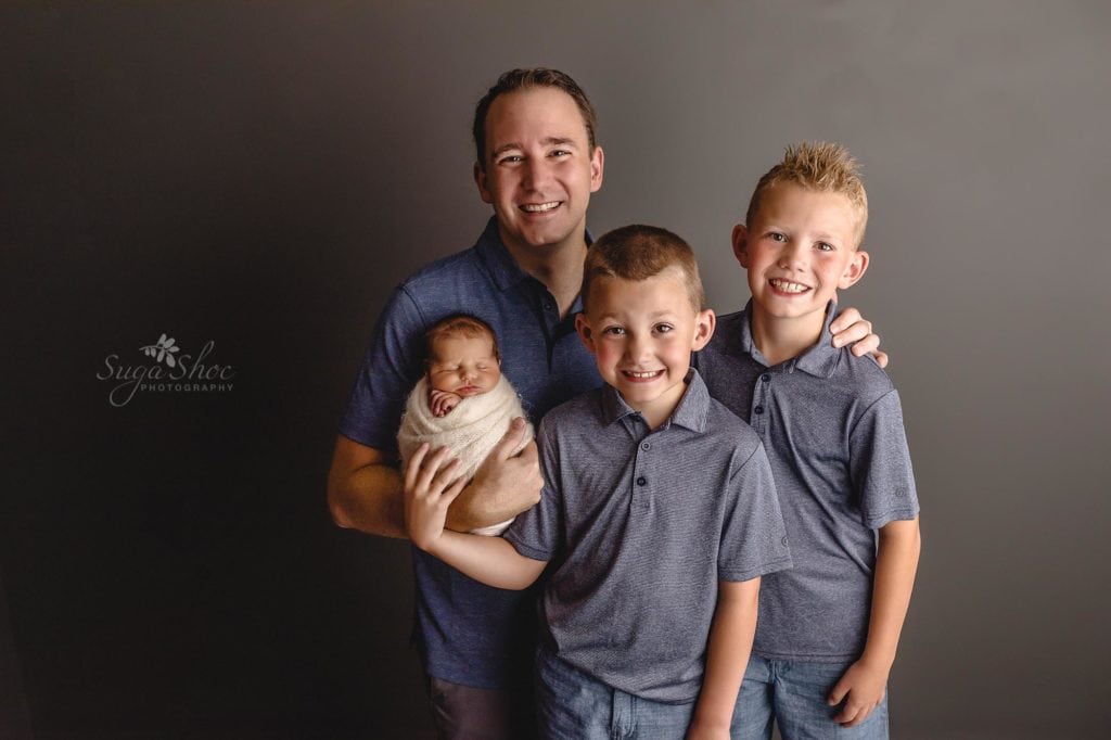 Sugashoc Photography Montgomery County Newborn Photographer boys pose with newborn son