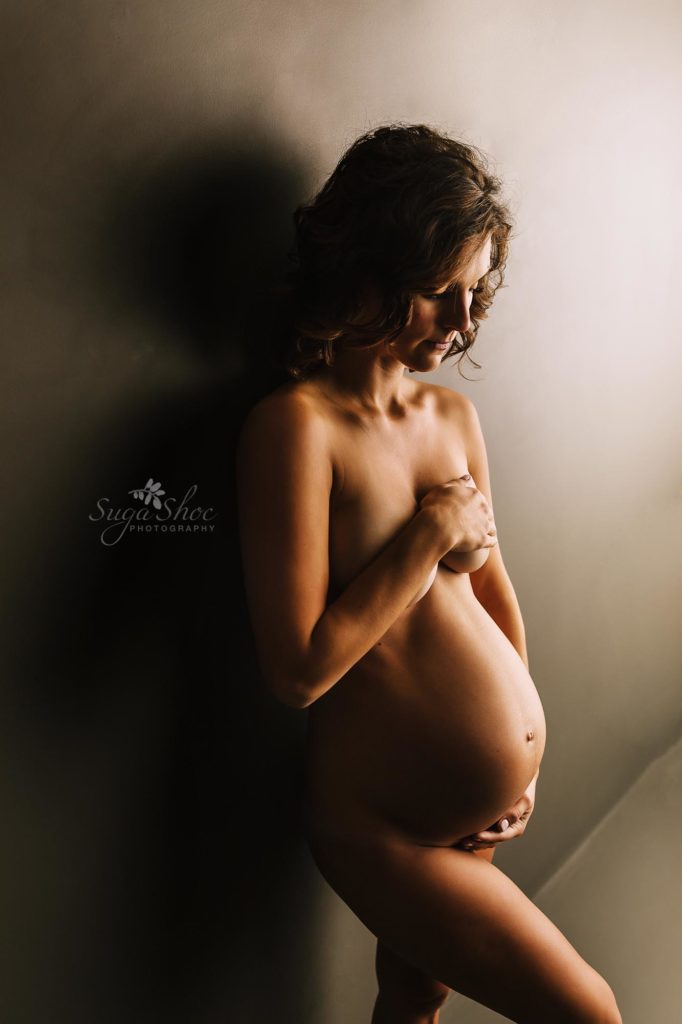 Philadelphia Maternity Boudoir Photographer SugaShoc Photography pregnant woman naked cradling belly