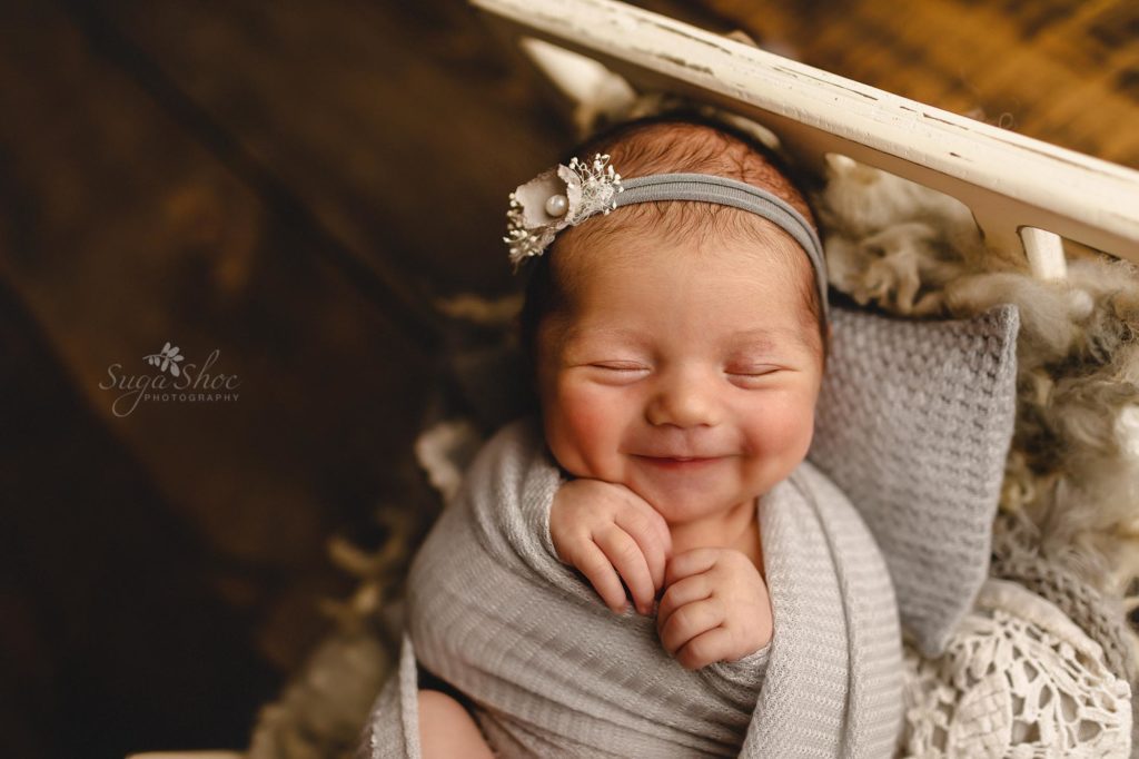 SugaShoc Photography Neutral Newborn Photo Session, gray wrap with floral headband