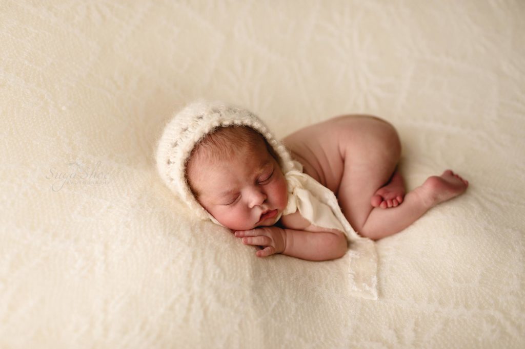 SugaShoc Photography Neutral Newborn Photo Session, white blanket with white bonnet