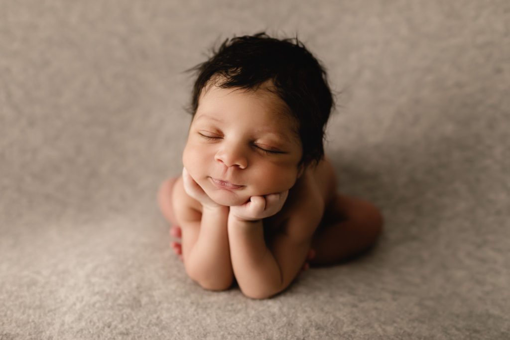 doylestown newborn photography studio, newborn boy asleep with chin on hands