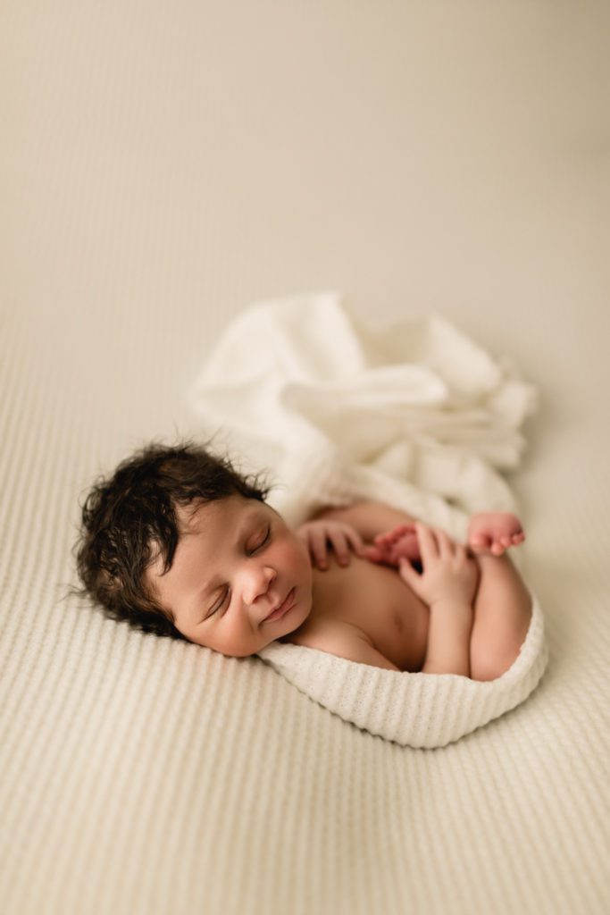 studio newborn photos, newborn boy in white wrap
