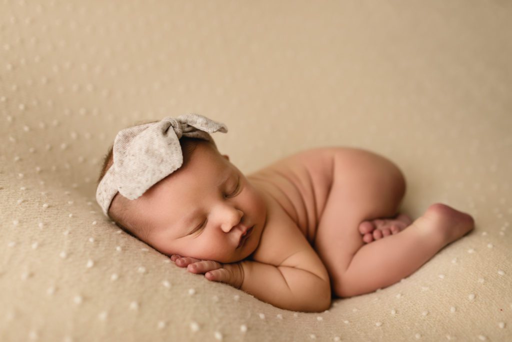 newborn photographer near me pa, sleeping baby with oversized bow headband