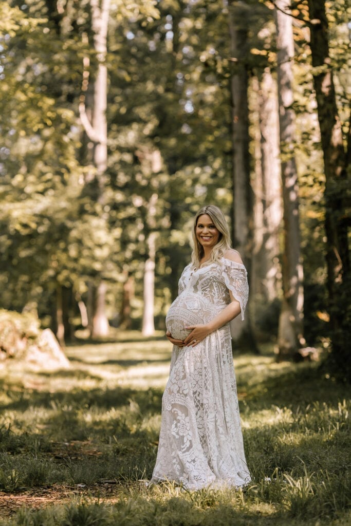 Maternity photographer bucks county pa, mother in white maternity dress outdoors