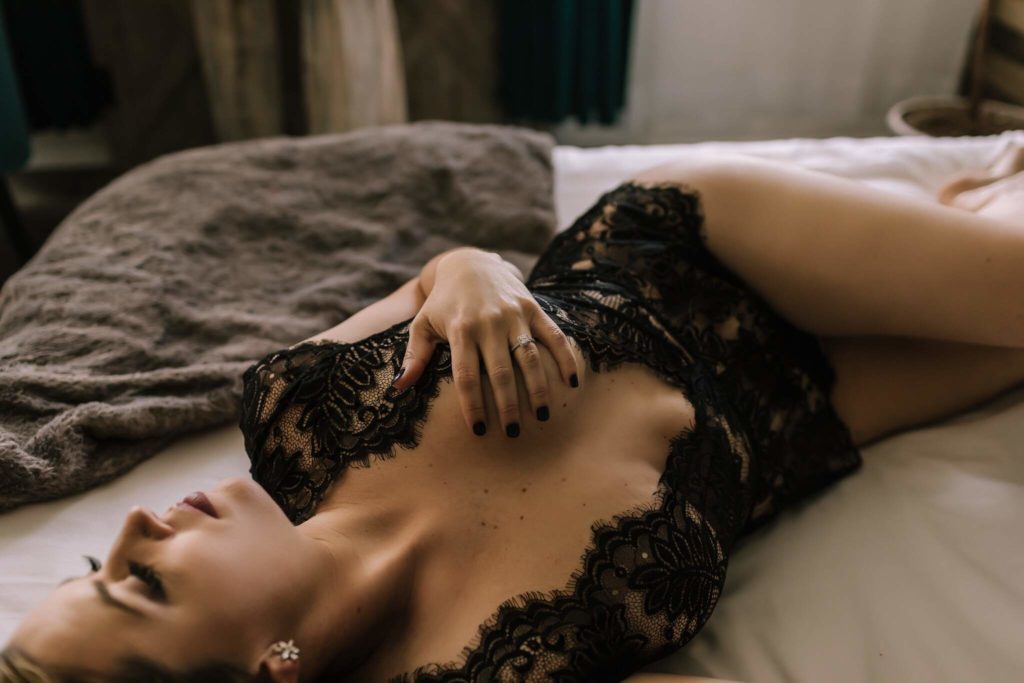 Beautiful, sexy, and confident boudoir session in Doylestown, PA using personal lingerie and items. On site hair and makeup. Full, partial, and implied nude.