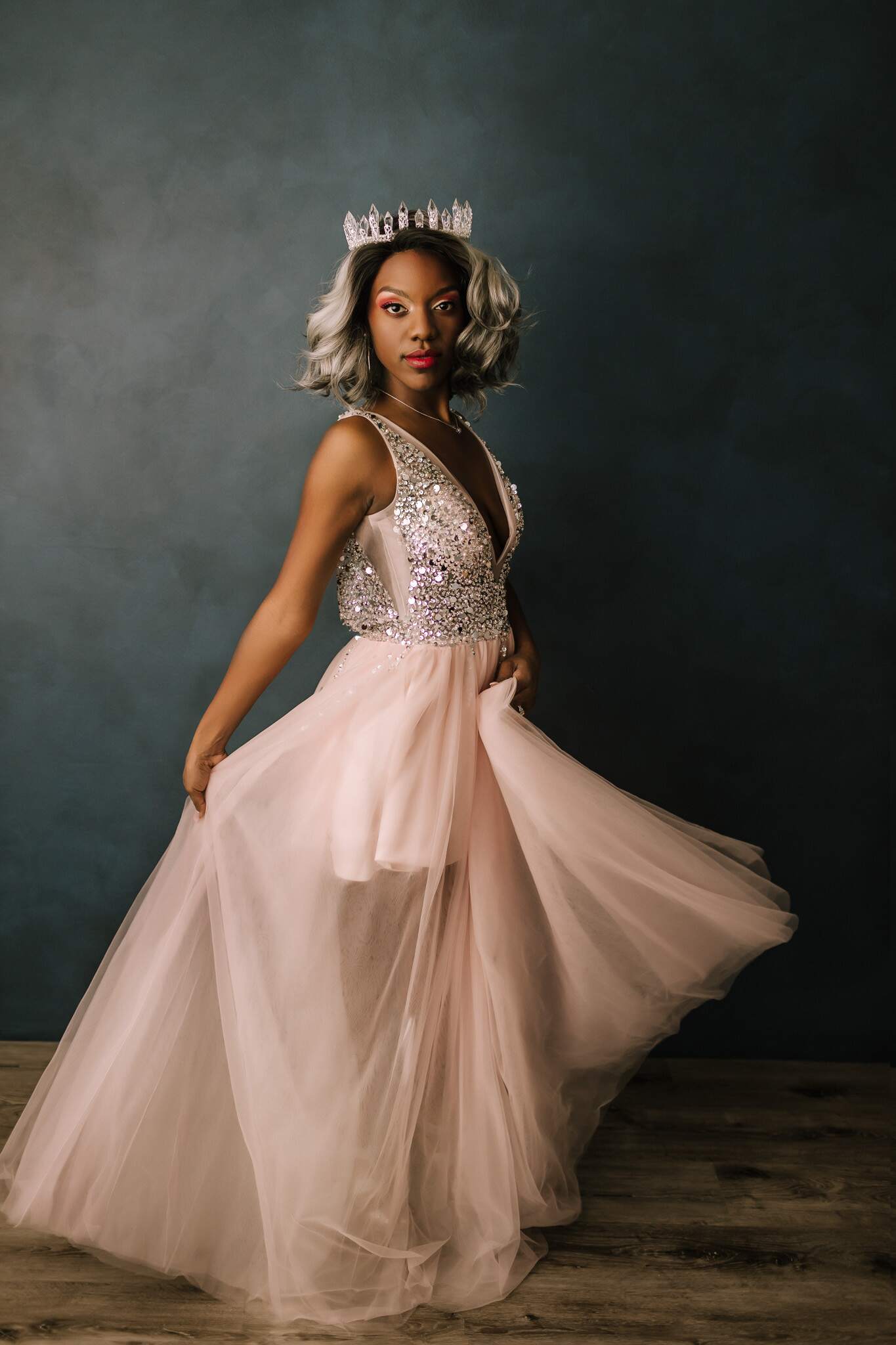 Professional, sexy and fun beauty shots in a studio in PA in formal gowns and crowns.