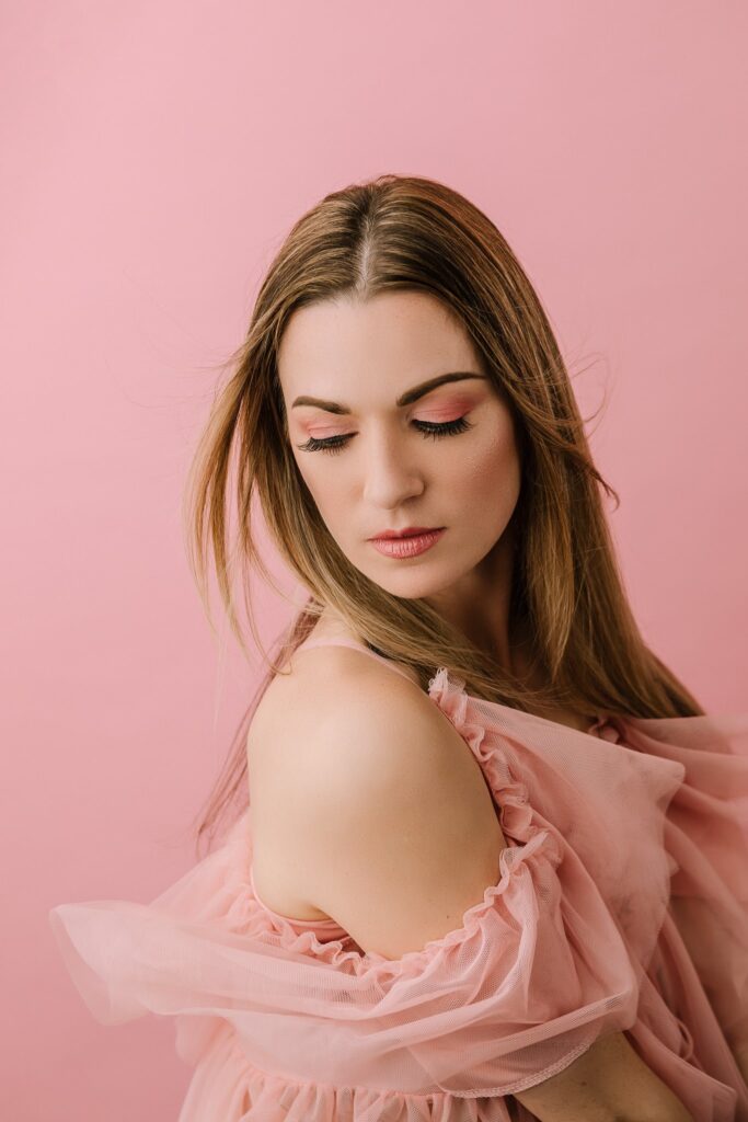 Pink aesthetic beauty photoshoot with professional hair and makeup