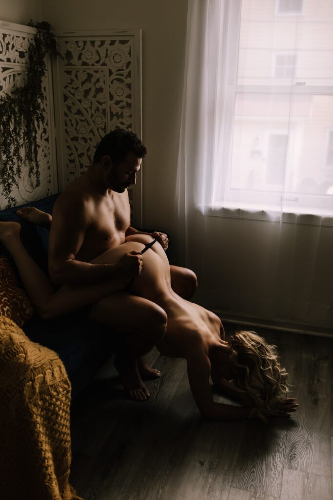 Sexy and nude couple's boudoir session